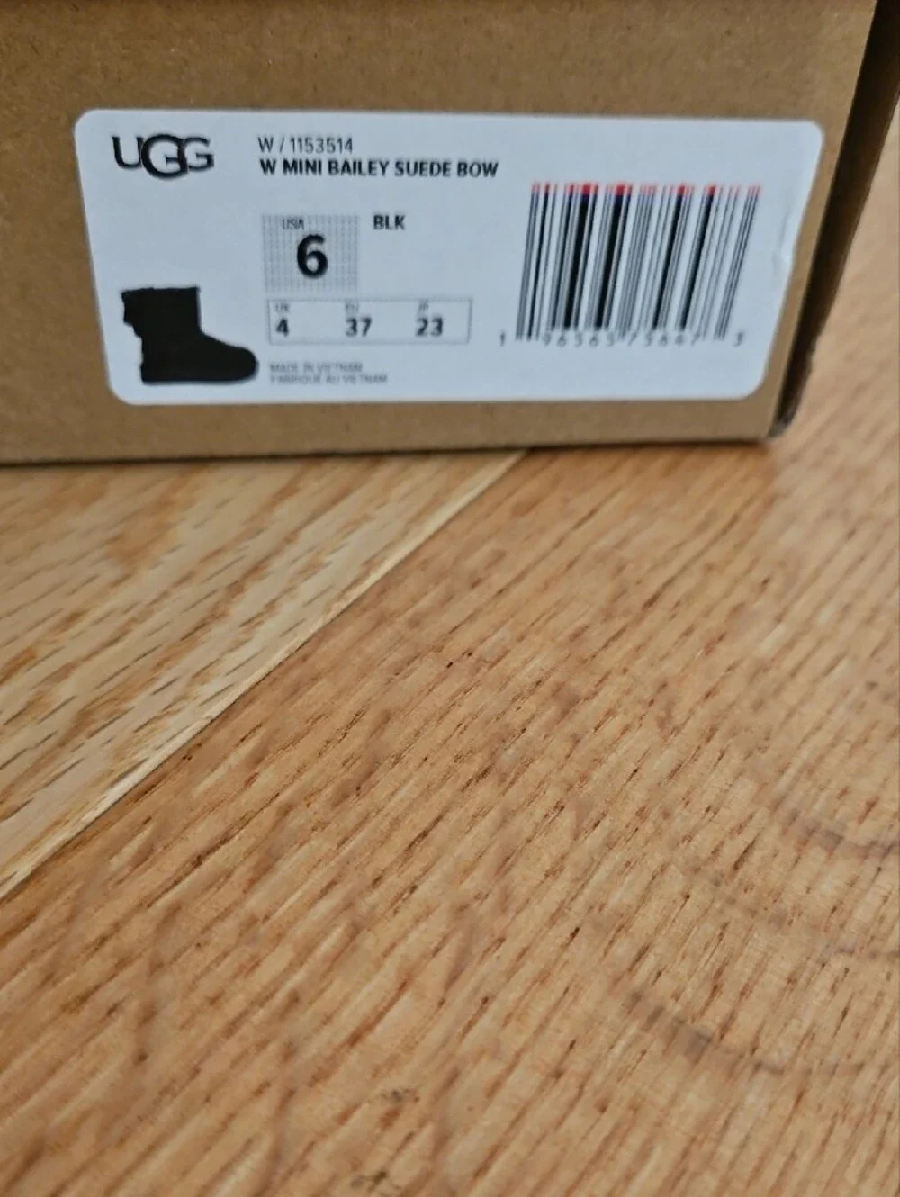 UGG Black Mini Bow Shearling Boots